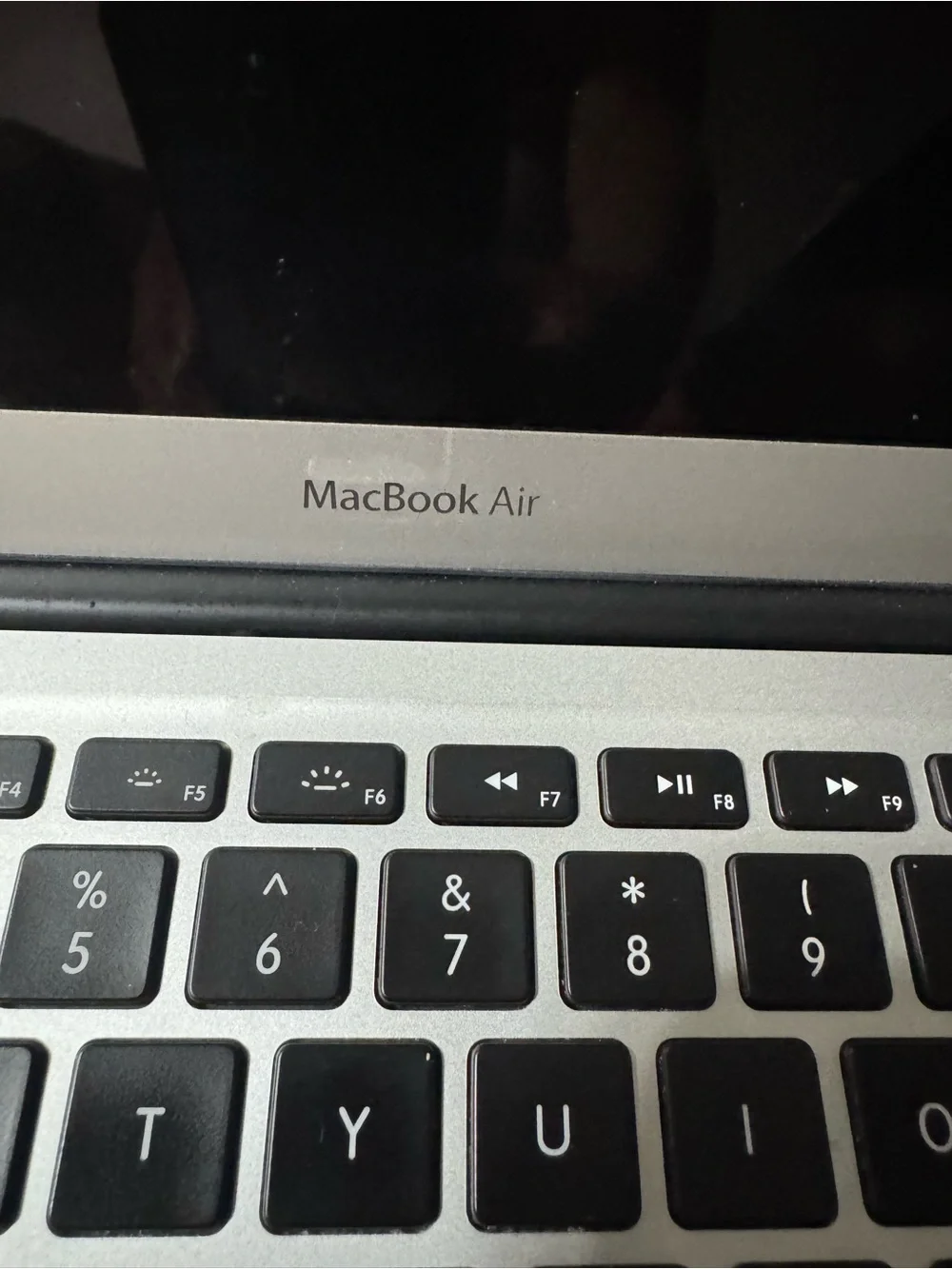 Apple Silver MacBook Laptop with Apple Logo